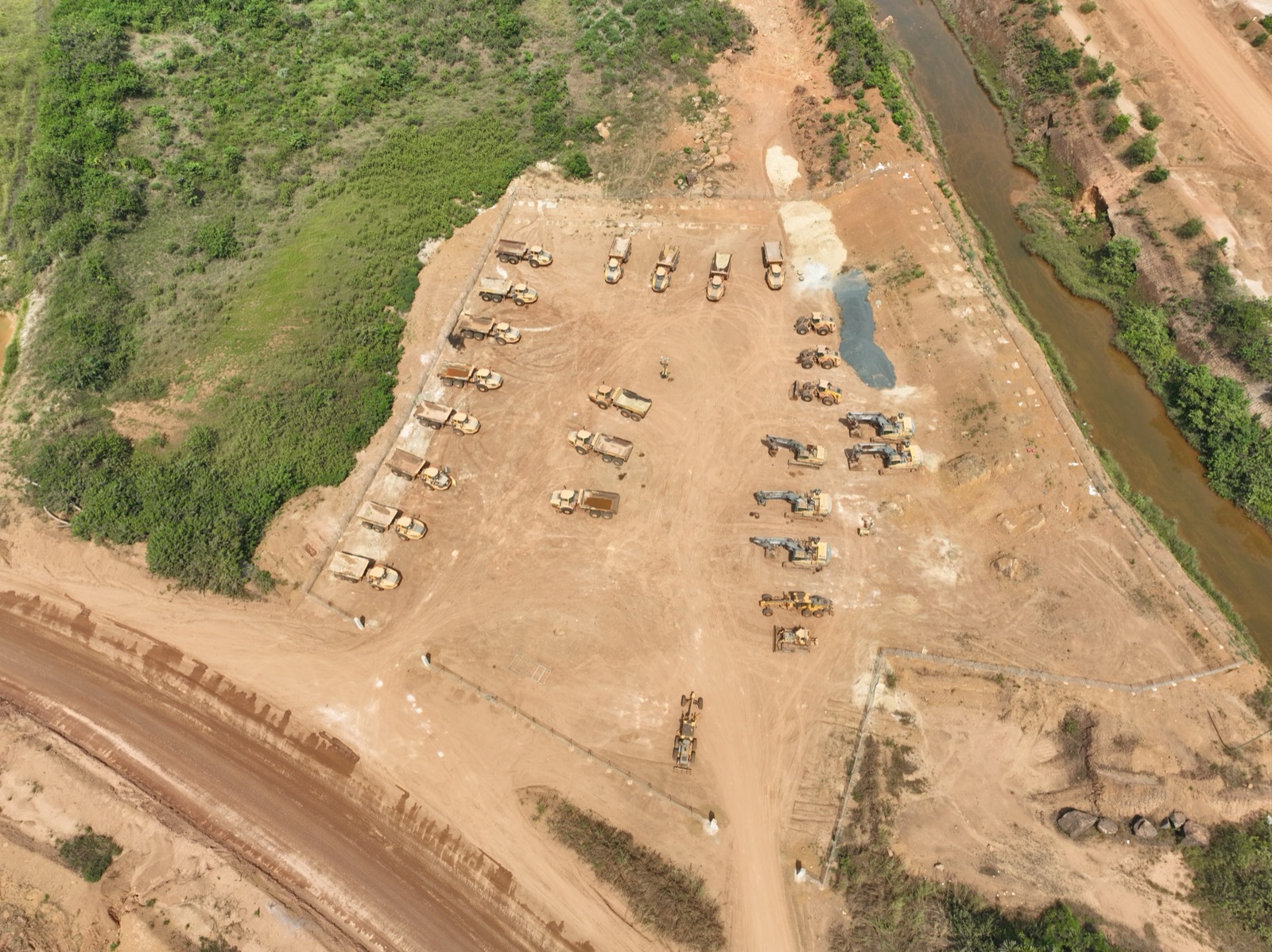 Mano Mining equipment fleet staged at the operations site